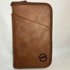 Magellan Outdoors faux leather passport travel wallet with zipper